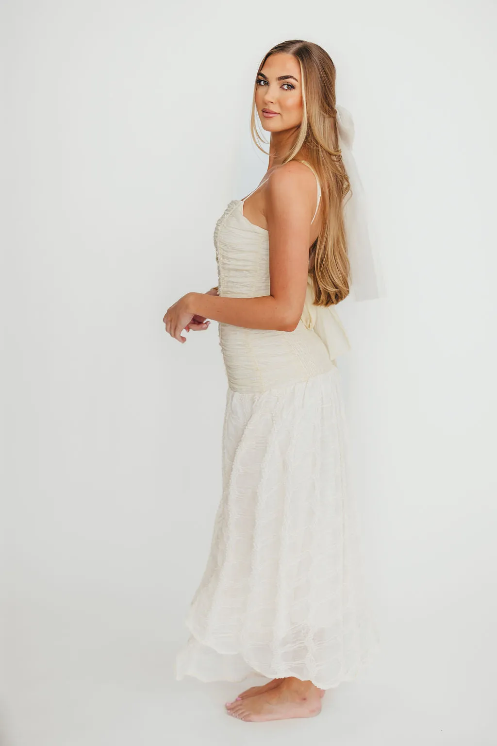 Rosie Ruched Maxi Dress With Bow Back Detail in Cream